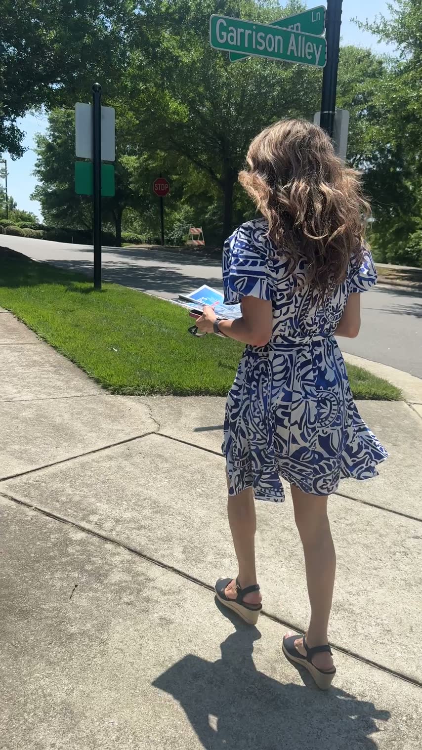 Christine walking a Triangle neighborhood
